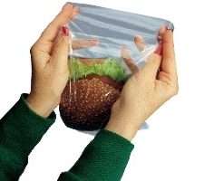 two hands holding a sandwich bag