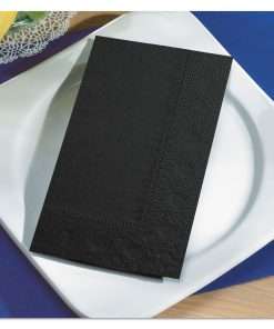 black dinner napkin on white plate with blue background