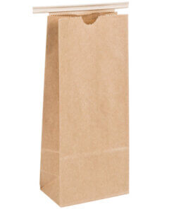 Brown paper bag with close ties at top